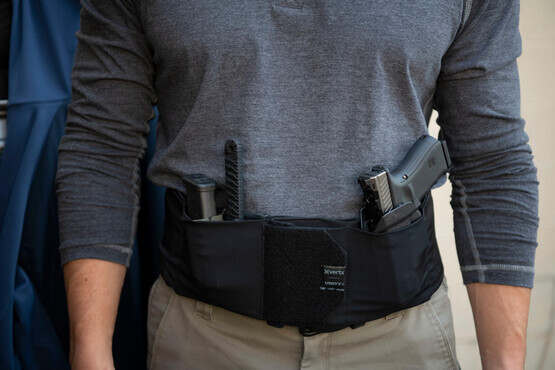 Vertx Unity Clutch Belt is designed like a belly band that can hold a full size pistol with gear